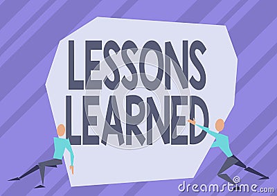 Handwriting text Lessons Learned. Business approach Promote share and use knowledge derived from experience Two Men Stock Photo