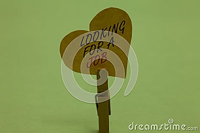 Handwriting text Looking For A Job. Concept meaning Unemployed seeking work Recruitment Human Resources Celadon color background p Stock Photo