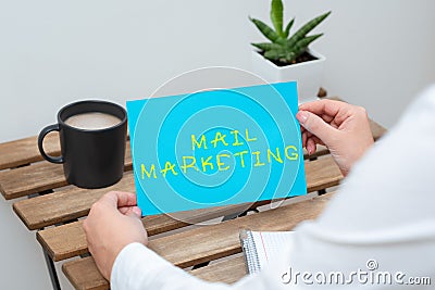 Handwriting text Mail Marketing. Word Written on sending a commercial message to build a relationship with a buyer Stock Photo