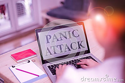 Handwriting text Panic Attack. Concept meaning sudden periods of intense fear that may include palpitations woman laptop Stock Photo