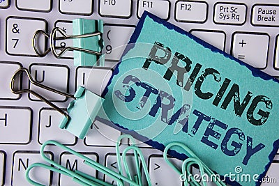 Handwriting text Pricing Strategy. Concept meaning Marketing sales strategies profit promotion campaign written on Sticky Note pap Stock Photo