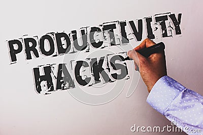 Handwriting text Productivity Hacks. Concept meaning Hacking Solution Method Tips Efficiency Productivity Advisors hand holding bl Stock Photo