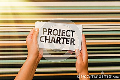 Handwriting text Project Charter. Business overview typically short formal document that describes your project Voice Stock Photo