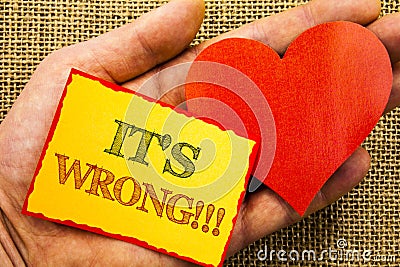 Handwriting text showing It Is Wrong. Business concept for Correct Right Decision To Make Or Mistake Advice written on Sticky Note Stock Photo