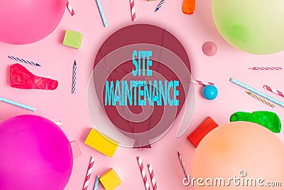 Hand writing sign Site Maintenance. Business concept keeping the website secure updated running and bugfree Colorful Stock Photo