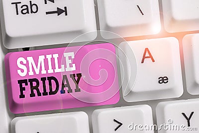 Handwriting text Smile Friday. Concept meaning used to express happiness from beginning of fresh week White pc keyboard Stock Photo