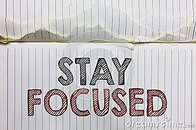 Handwriting text Stay Focused. Concept meaning Be attentive Concentrate Prioritize the task Avoid distractions Open notebook page Stock Photo