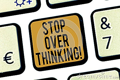 Handwriting text Stop Over Thinking. Concept meaning avoid think about something too much or for long Keyboard key Stock Photo