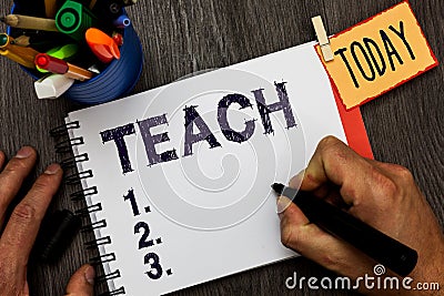 Handwriting text Teach. Concept meaning impart knowledge or instruct someone as to how do something right Man holding Stock Photo