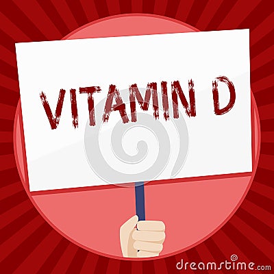 Handwriting text Vitamin D. Concept meaning Benefits of sunbeam exposure and certain fat soluble nutriments Hand Holding Stock Photo