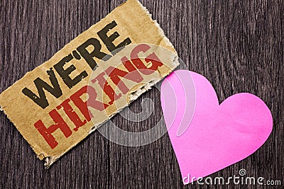 Handwriting text Were Hiring. Concept meaning Recruiting Hiring Now Recruitment Vacancy Announced Hire written on Cardboard Piec Stock Photo