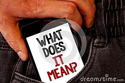 Handwriting text What Does It Mean Question. Concept meaning Confusion Curiosity Questioning Inquire Brown jeans back pocket hand Stock Photo