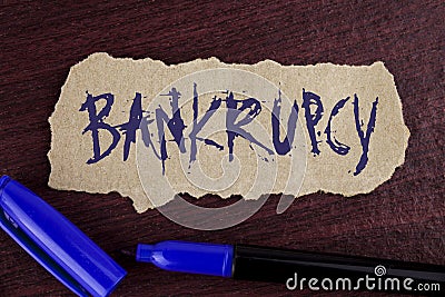 Handwriting text writing Bankrupcy. Concept meaning Company under financial crisis goes bankrupt with declining sales written on T Stock Photo