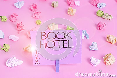 Handwriting text writing Book Hotel. Concept meaning an arrangement you make to have a hotel room or accommodation Colored Stock Photo