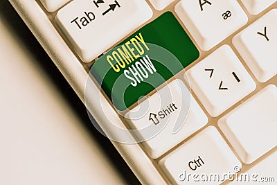 Handwriting text writing Comedy Show. Concept meaning Funny program Humorous Amusing medium of Entertainment White pc Stock Photo