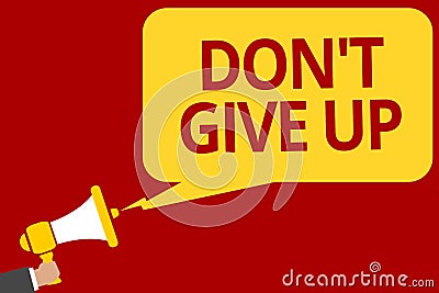 Handwriting text writing Don t not Give Up. Concept meaning Determined Persevering Continue to Believe in Yourself Man Stock Photo