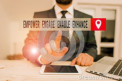Handwriting text writing Empower Engage Enable Enhance. Concept meaning Empowerment Leadership Motivation Engagement. Stock Photo