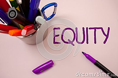 Handwriting text writing Equity. Concept meaning Value of a company divided into equal parts owned by shareholders White backgroun Stock Photo