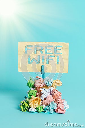 Handwriting text writing Free Wifi. Concept meaning let you connect to the Internet in public places without paying Reminder pile Stock Photo