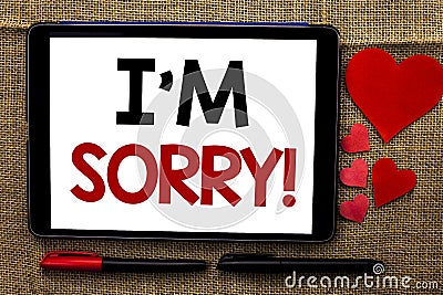 Handwriting text writing I m Sorry. Concept meaning Apologize Conscience Feel Regretful Apologetic Repentant Sorrowful written on Stock Photo