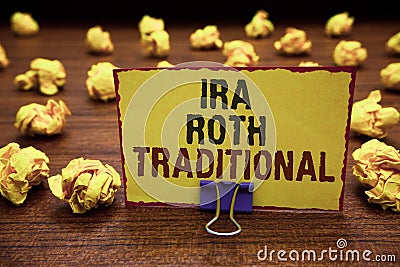 Handwriting text writing Ira Roth Traditional. Concept meaning are tax deductible on both state and federal Yellow sticky card cli Stock Photo