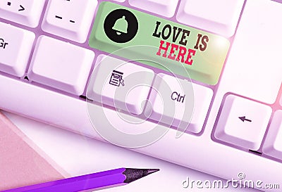 Handwriting text writing Love Is Here. Concept meaning Roanalysistic feeling Lovely emotion Positive Expression Care Joy Stock Photo