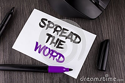 Handwriting text writing Spread The Word. Concept meaning Run advertisements to increase store sales many fold written on White St Stock Photo