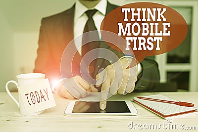 Handwriting text writing Think Mobile First. Concept meaning Easy Handheld Device Accessible Contents 24 or7 Handy Male Stock Photo