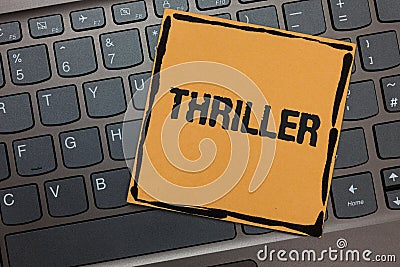Handwriting text writing Thriller. Concept meaning Chilling frightful moments in life film and movie category Black laptop keyboar Stock Photo