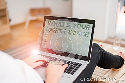 Handwriting text writing What S Your Competitive Advantage Question. Concept meaning Marketing strategy Plan woman Stock Photo