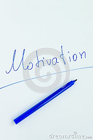 Handwritten motivational phrase `Motivation` Stock Photo
