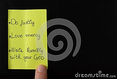 Handwritten note with an old testament Bible verse Micah 6:8 prophet, justice, mercy, love, humility biblical concept Stock Photo