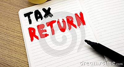 Handwritten text caption showing Tax Return. Business concept writing for Accounting Money Return written on notebook with copy sp Stock Photo