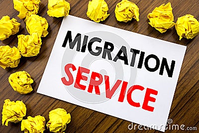 Handwritten text showing word Migration Service. Business concept writing Online Network Idea Written on sticky note paper, wooden Stock Photo