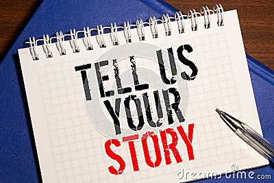 Handwritten text TELL US YOUR STORY Stock Photo