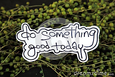 Handwritten words Do Something Good Today Stock Photo