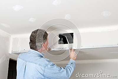 Home Improvement, Contractor Man Install Drywall Stock Photo