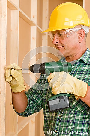 Handyman home improvement working with screwdriver Stock Photo