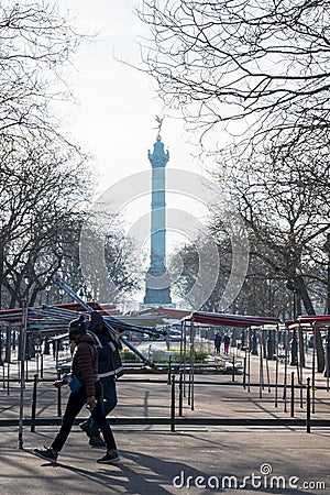 Handymen and workers carrying frames and poles to set up the stalls of the wet market Editorial Stock Photo