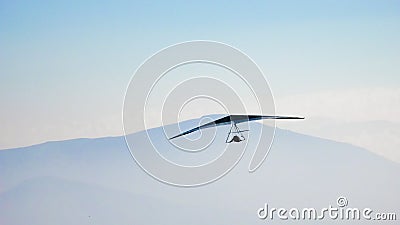 Hang glider flying Stock Photo