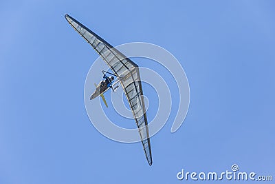 Hang glider wing making maneuvers Stock Photo