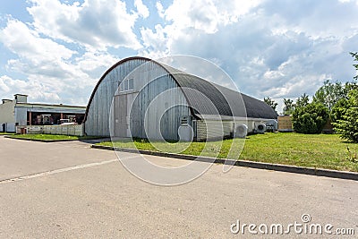 Hangar for fruits and vegetables in storage stock. production warehouse. Plant Industry Stock Photo