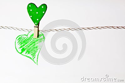Hanged green heart Stock Photo