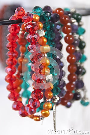 Hanging beautiful colorful bead necklaces in store Stock Photo