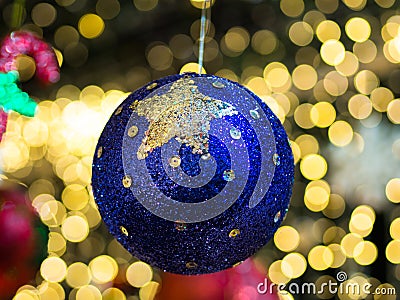 Hanging Blue Gillter Christmas Ball On Christmas Bokeh Lights Blurred Background Stock Photo