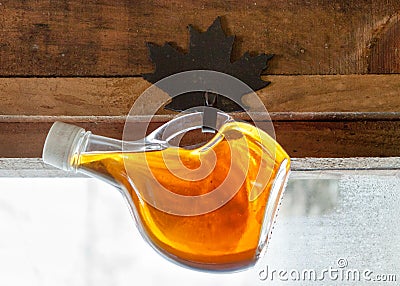 Hanging Bottle of Maple Syrup Stock Photo