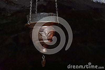 Hanging bronze cup in greek church of the annunciation cave nazareth Editorial Stock Photo