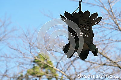 Hanging bronze lanterns in a Buddhism temple Stock Photo