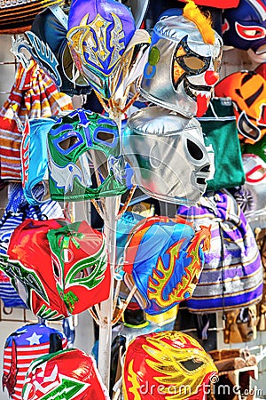 Hanging colorful Mexican Lucha Libre wrestling masks Stock Photo