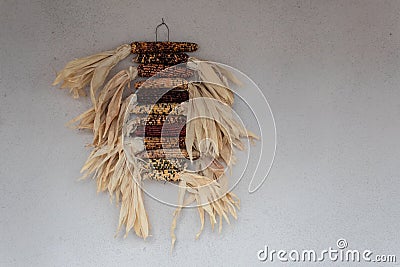 Hanging ears of colorful dried corn, American Southwest Santa Fe Stock Photo